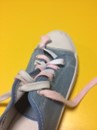 shoe with laces cut in half